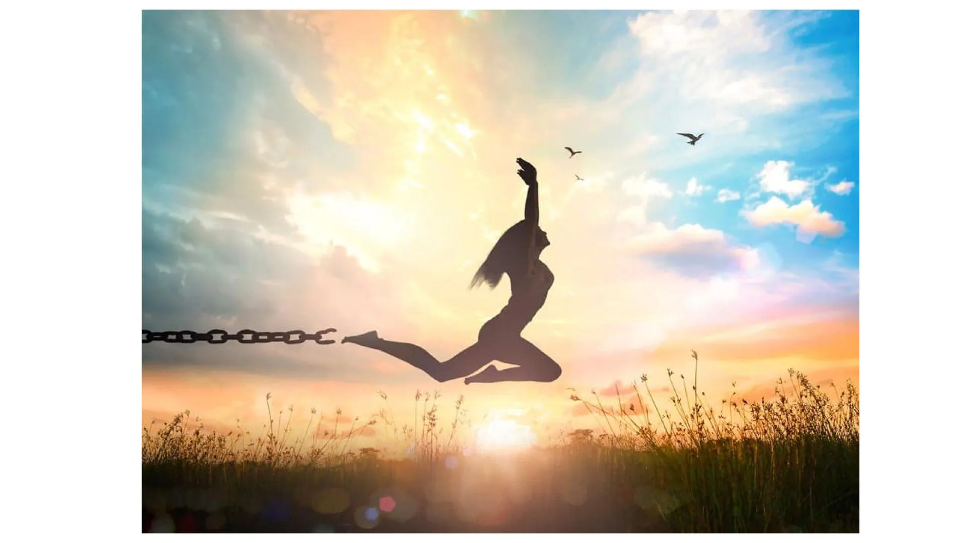 A joyful healer breaking free beneath a radiant sunrise